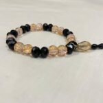 Black pink gold bracelet.