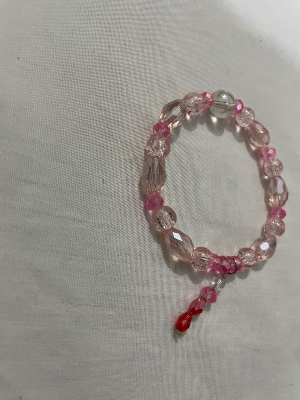 Pink beaded bracelet.