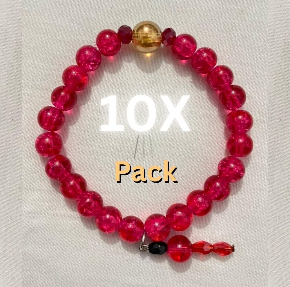 Magenta gold beaded bracelet.