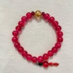 Magenta gold beaded bracelet.