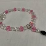 Clear pink beaded bracelet.