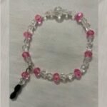 Clear pink beaded bracelet.