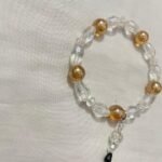 Gold clear bracelet.