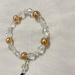Gold clear bracelet.