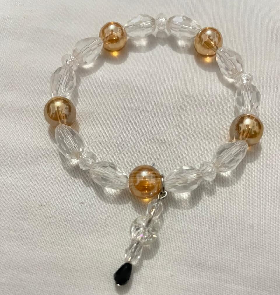 Gold clear bracelet.